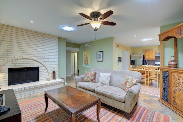 5610 Christie Ln, Garland, TX 75044 - living room with a ceiling fan, a fireplace, and recessed lighting