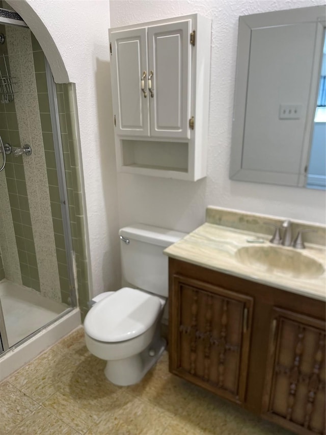 1505 Windy Meadow Dr, Plano, TX 75023 - bathroom with vanity, a shower stall, and a textured wall