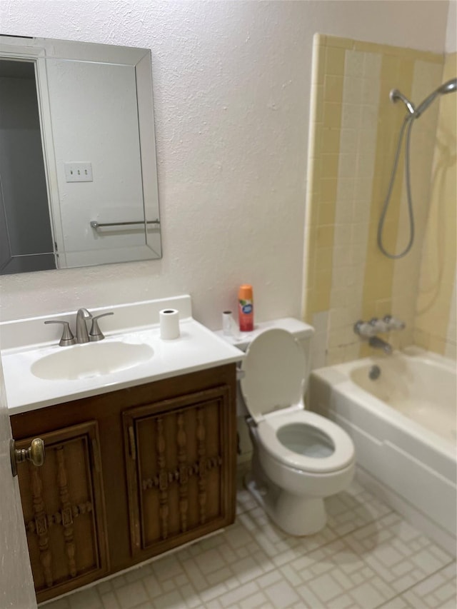 1505 Windy Meadow Dr, Plano, TX 75023 - bathroom with vanity, tub / shower combination, and a textured wall