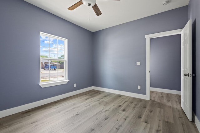 620 S First, Sherman, TX 75090 - spare room with ceiling fan, a smoke detector, and light wood-style flooring
