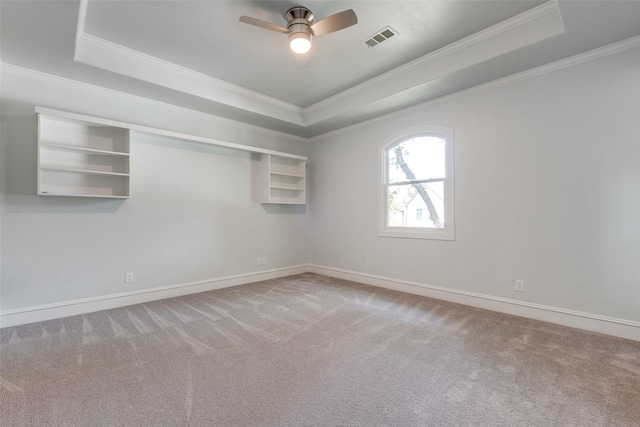 4421 Caruth Blvd, Dallas, TX 75225 - empty room featuring a raised ceiling, ornamental molding, carpet flooring, and ceiling fan