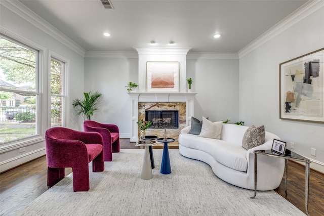 4421 Caruth Blvd, Dallas, TX 75225 - living area with wood finished floors, a high end fireplace, plenty of natural light, crown molding, and recessed lighting