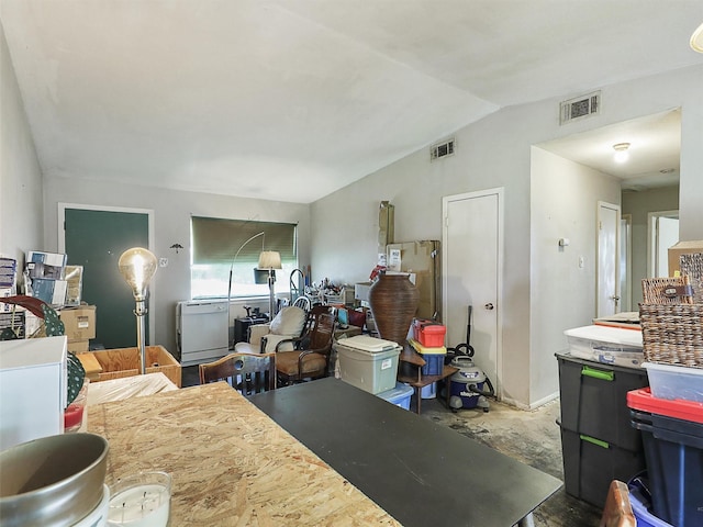 2407 Towerwood Dr, Carrollton, TX 75006 - kitchen featuring vaulted ceiling and freestanding refrigerator