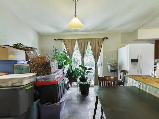 2407 Towerwood Dr, Carrollton, TX 75006 - dining area featuring concrete flooring