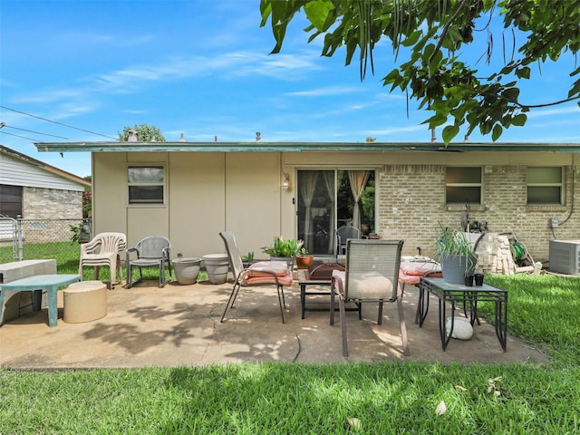 2407 Towerwood Dr, Carrollton, TX 75006 - back of house with a patio area, stucco siding, and brick siding