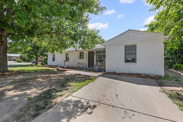 6301 Shadydell Dr, Fort Worth, TX 76135 - ranch-style house featuring brick siding