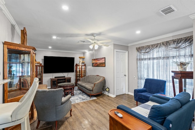 6301 Shadydell Dr, Fort Worth, TX 76135 - living room featuring crown molding, wood finished floors, ceiling fan, and recessed lighting