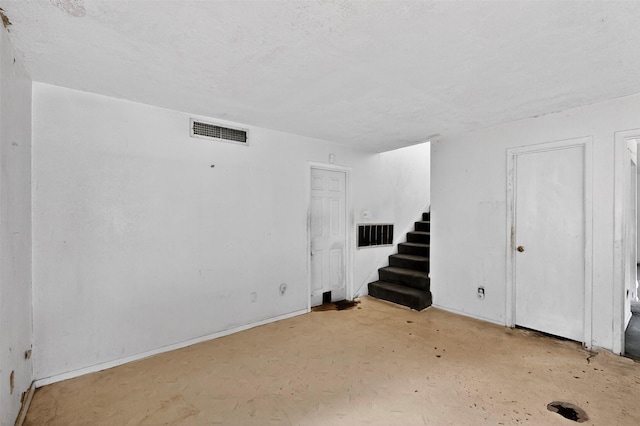 1801 Plantation Rd, Garland, TX 75044 - basement with stairway and baseboards