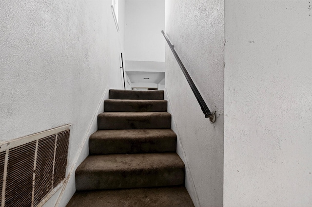 1801 Plantation Rd, Garland, TX 75044 - staircase featuring carpet