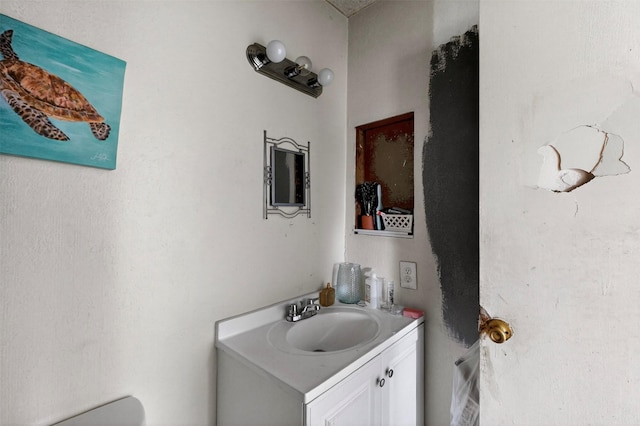 1801 Plantation Rd, Garland, TX 75044 - half bathroom featuring vanity and toilet