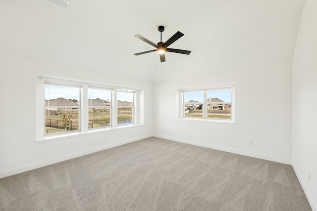 2500 Fischer Ln, Mansfield, TX 76063 - unfurnished room featuring light carpet, healthy amount of natural light, ceiling fan, and vaulted ceiling