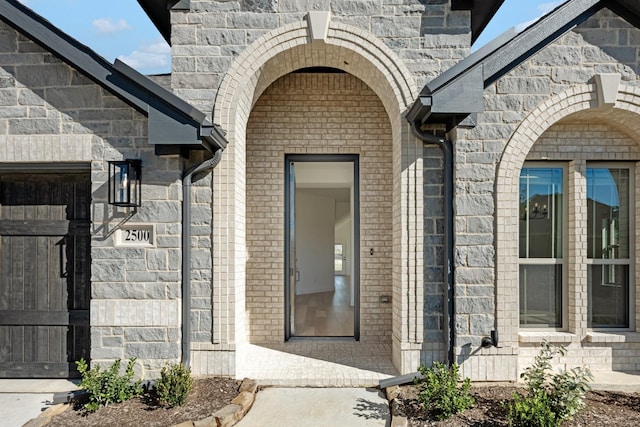 2500 Fischer Ln, Mansfield, TX 76063 - view of exterior entry featuring stone siding and brick siding