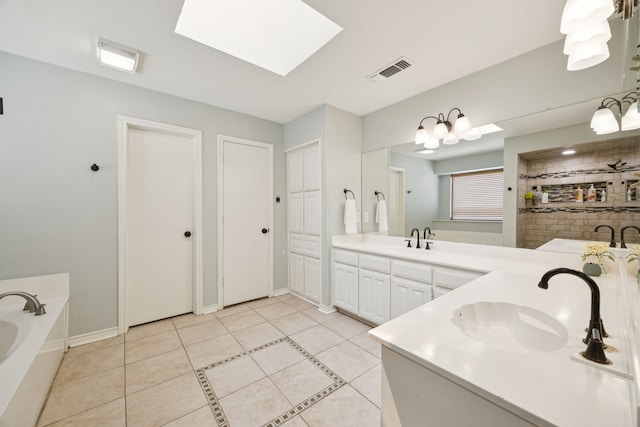 2705 Serenade Ct, Arlington, TX 76015 - bathroom with double vanity, a garden tub, tile patterned flooring, and a skylight