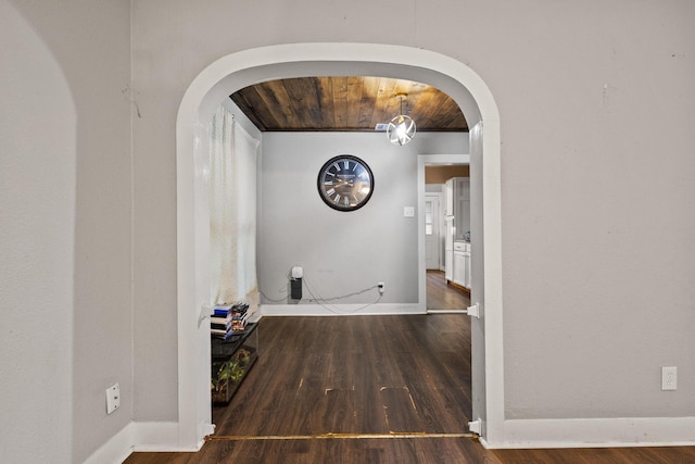 1601 W Bond St, Denison, TX 75020 - unfurnished room featuring wood finished floors, arched walkways, and wooden ceiling