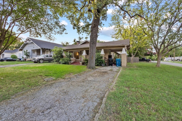 1601 W Bond St, Denison, TX 75020 - view of front of house featuring a front lawn, driveway, and a chimney