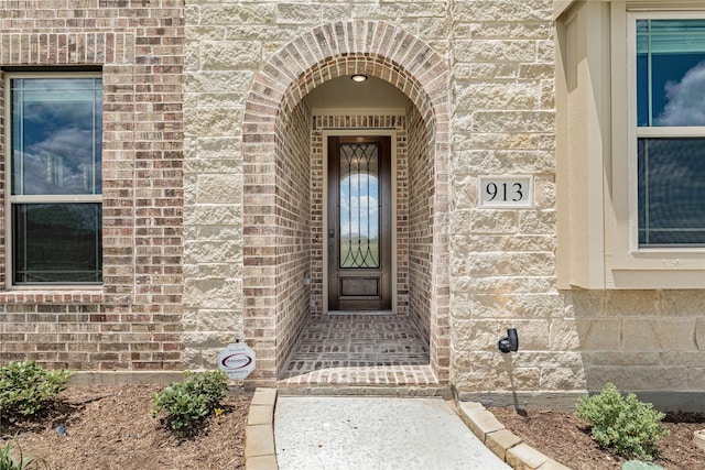 913 Cannes Dr, Red Oak, TX 75154 - property entrance featuring brick siding and stone siding