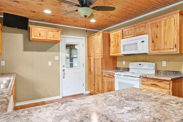 2911 W Day St, Denison, TX 75020 - kitchen with white appliances, wood finished floors, a ceiling fan, wooden walls, and recessed lighting