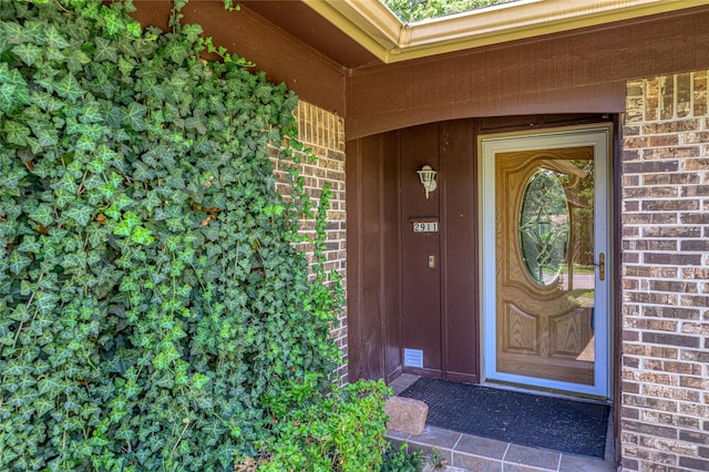 2911 W Day St, Denison, TX 75020 - doorway to property with brick siding