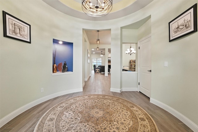 2605 Geer Ln, Mansfield, TX 76063 - hallway with a chandelier and wood finished floors