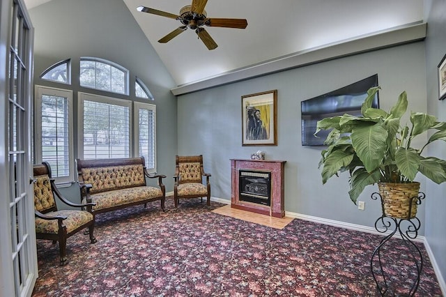 836 Nueces Trl, Midlothian, TX 76065 - living area featuring carpet flooring, high vaulted ceiling, ceiling fan, and a fireplace with flush hearth