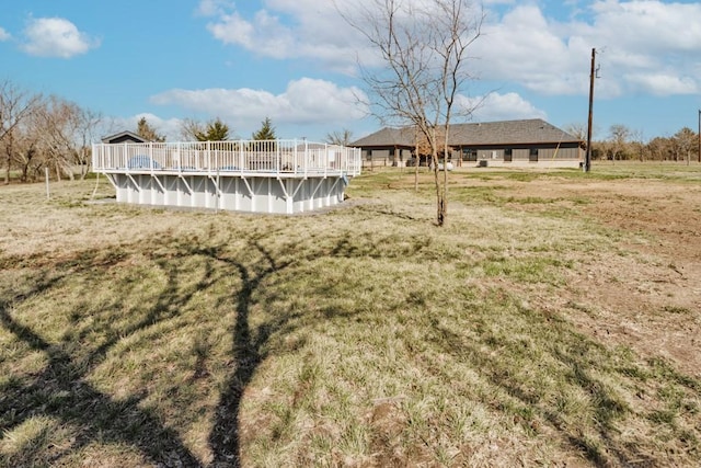 217 Polk, Bowie, TX 76230 - view of green lawn with an outdoor pool