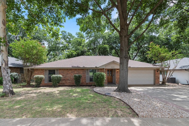 8620 S County Rd, Frisco, TX 75034 - ranch-style home featuring an attached garage, brick siding, driveway, a front lawn, and roof with shingles