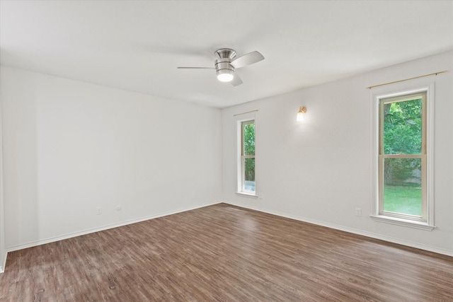 8620 S County Rd, Frisco, TX 75034 - spare room with wood finished floors, healthy amount of natural light, and ceiling fan