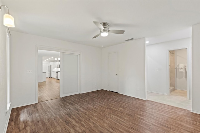 8620 S County Rd, Frisco, TX 75034 - unfurnished bedroom featuring wood finished floors and a ceiling fan