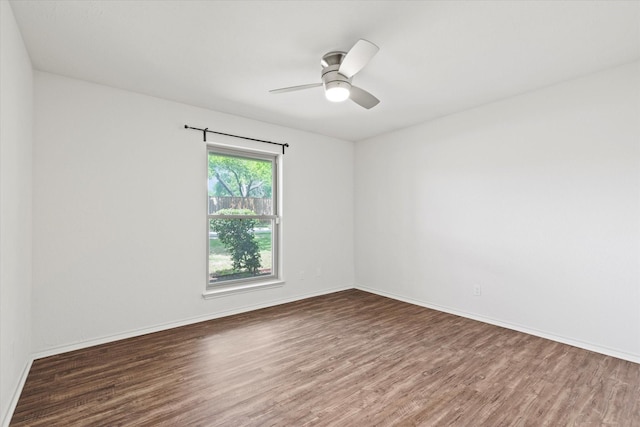 8620 S County Rd, Frisco, TX 75034 - spare room featuring wood finished floors and a ceiling fan
