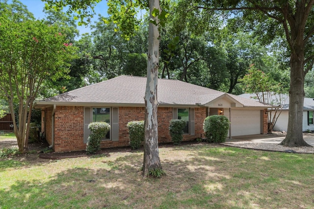 8620 S County Rd, Frisco, TX 75034 - ranch-style house featuring a garage, a front yard, brick siding, and a shingled roof