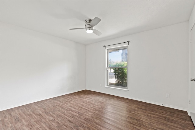 8620 S County Rd, Frisco, TX 75034 - unfurnished room featuring dark wood-style floors and ceiling fan