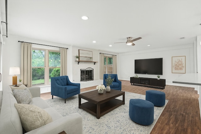 8620 S County Rd, Frisco, TX 75034 - living room featuring wood finished floors, ceiling fan, recessed lighting, and a brick fireplace