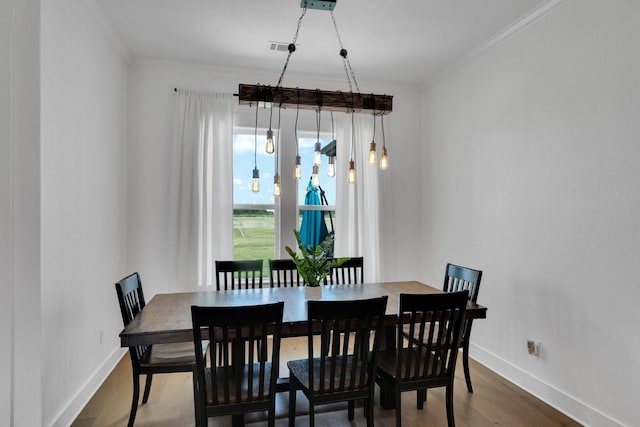 140 Friesian Ln, Waxahachie, TX 75167 - dining room with wood finished floors and crown molding
