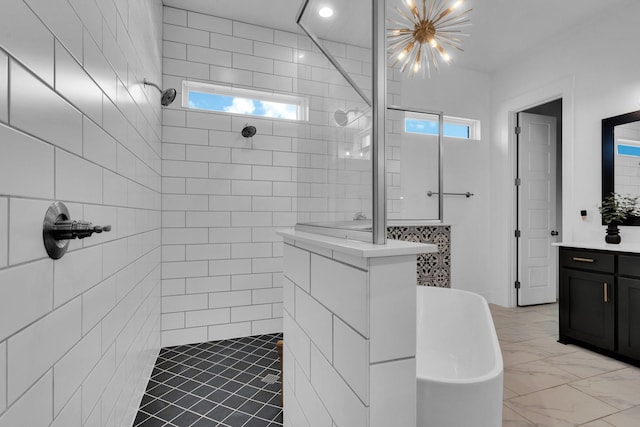 140 Friesian Ln, Waxahachie, TX 75167 - bathroom featuring vanity, marble finish floors, tiled shower, and a chandelier