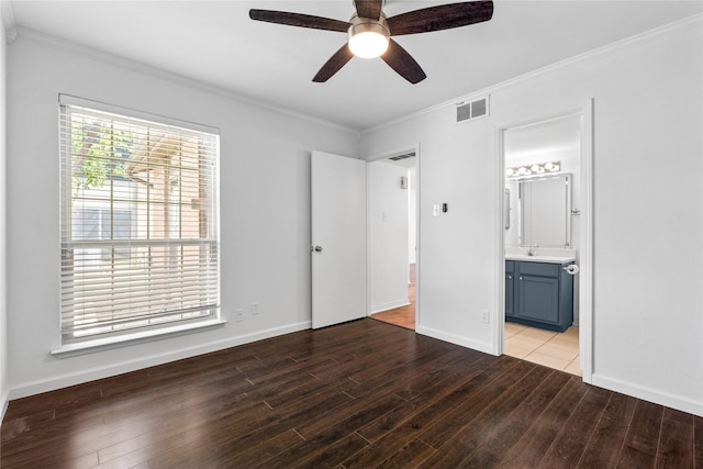 350 W Harwood Rd Unit A, Hurst, TX 76054 - unfurnished bedroom with wood finished floors, ornamental molding, ensuite bath, and ceiling fan