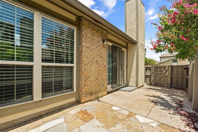 350 W Harwood Rd Unit A, Hurst, TX 76054 - view of patio / terrace with a gate