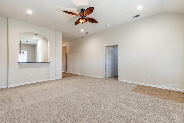 2836 Fordham Rd, Plano, TX 75025 - carpeted empty room featuring a ceiling fan, arched walkways, and recessed lighting