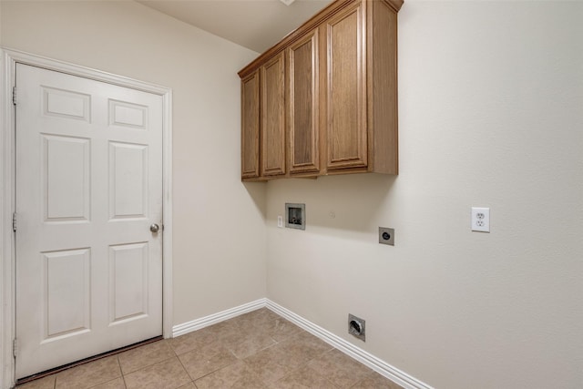 2836 Fordham Rd, Plano, TX 75025 - laundry room with hookup for an electric dryer, washer hookup, cabinet space, and light tile patterned floors
