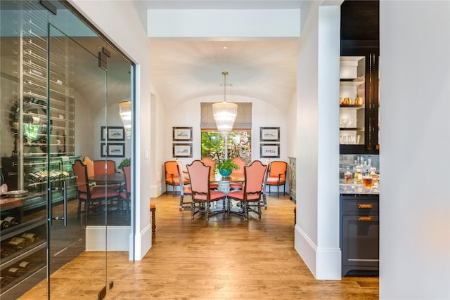 2307 Cedar Elm Ter, Westlake, TX 76262 - dining room featuring light wood-style floors, a bar, and vaulted ceiling