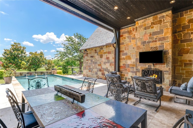 2307 Cedar Elm Ter, Westlake, TX 76262 - view of patio / terrace with an outdoor living space with a fireplace