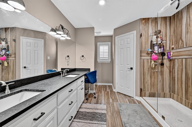 218 Bryant St, Pottsboro, TX 75076 - full bath with double vanity, a stall shower, and wood finished floors