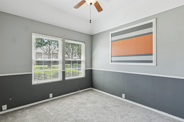 10412 Harris Ct, Irving, TX 75063 - carpeted spare room with ceiling fan and baseboards
