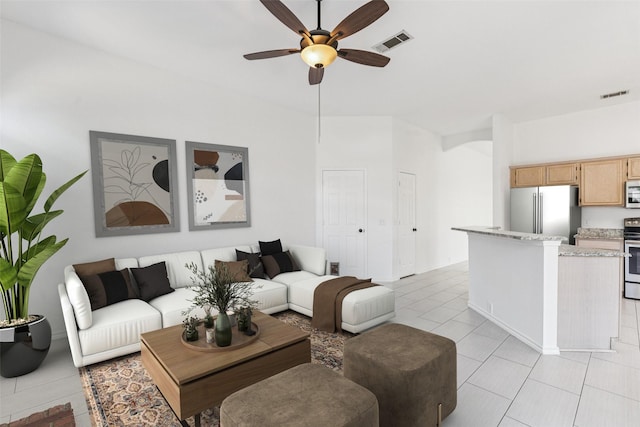 10412 Harris Ct, Irving, TX 75063 - living room with a ceiling fan and light tile patterned floors