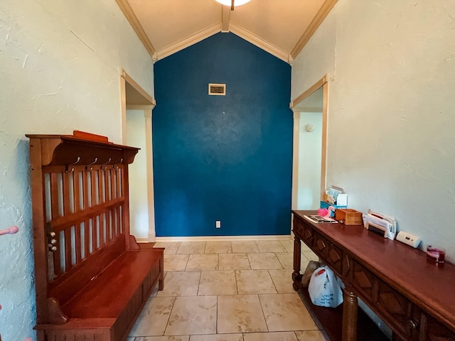 5624 Charlott St, Fort Worth, TX 76112 - foyer entrance with lofted ceiling, crown molding, and tile patterned floors