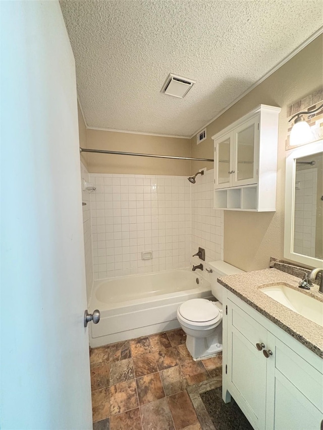 1805 W Spring Creek Pkwy Unit Z2, Plano, TX 75023 - full bath with vanity, tub / shower combination, a textured ceiling, and stone finish flooring