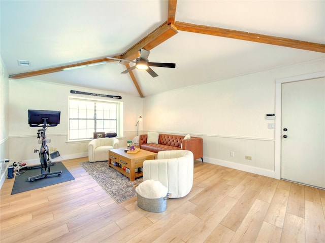 2219 Timberwood, Carrollton, TX 75006 - living room with ceiling fan, wood finished floors, and wainscoting