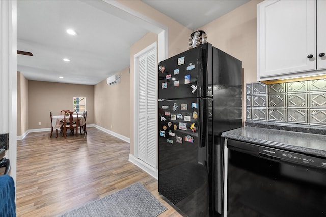 336 Arrowhead St, Fort Worth, TX 76108 - kitchen with black appliances, white cabinetry, light wood finished floors, backsplash, and dark countertops