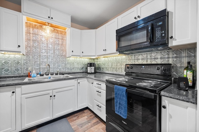 336 Arrowhead St, Fort Worth, TX 76108 - kitchen with black appliances, tasteful backsplash, and white cabinetry