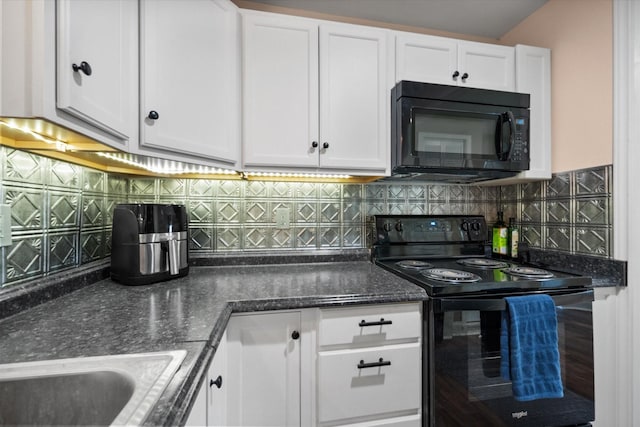 336 Arrowhead St, Fort Worth, TX 76108 - kitchen featuring black appliances, white cabinetry, tasteful backsplash, and dark stone counters