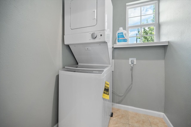 336 Arrowhead St, Fort Worth, TX 76108 - laundry area featuring stacked washer / drying machine and tile patterned flooring